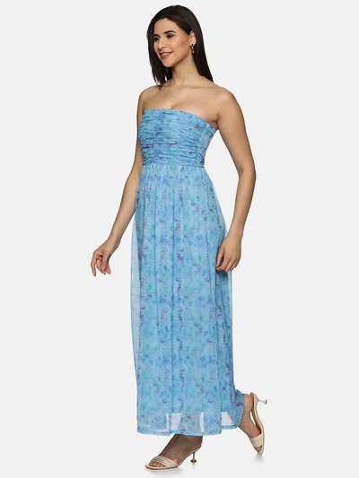 A model wearing a floral blue maxi dress