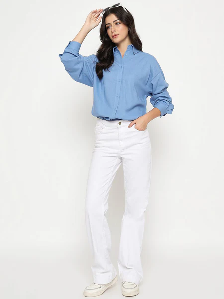 A model wearing a linen blend cobalt blue shirt