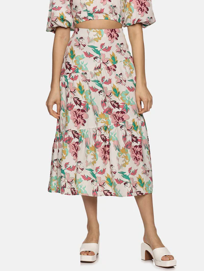 A model wearing a floral multicolor midaxi skirt